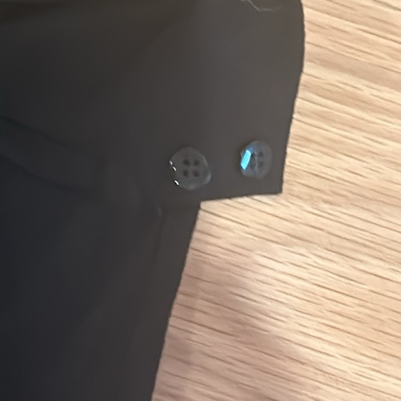 Black turtleneck buttons on the inside small circle on the back - Picture 4 of 4
